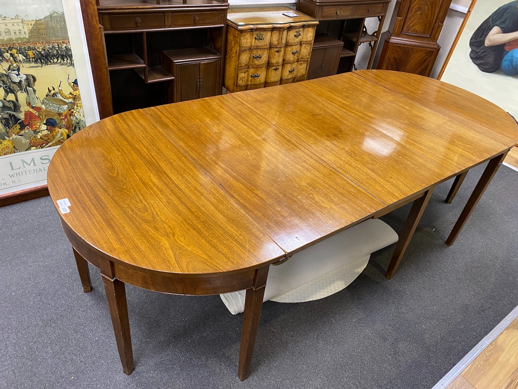 A George III mahogany extending D end dining table, 240cm extended, depth 105cm, height 70cm